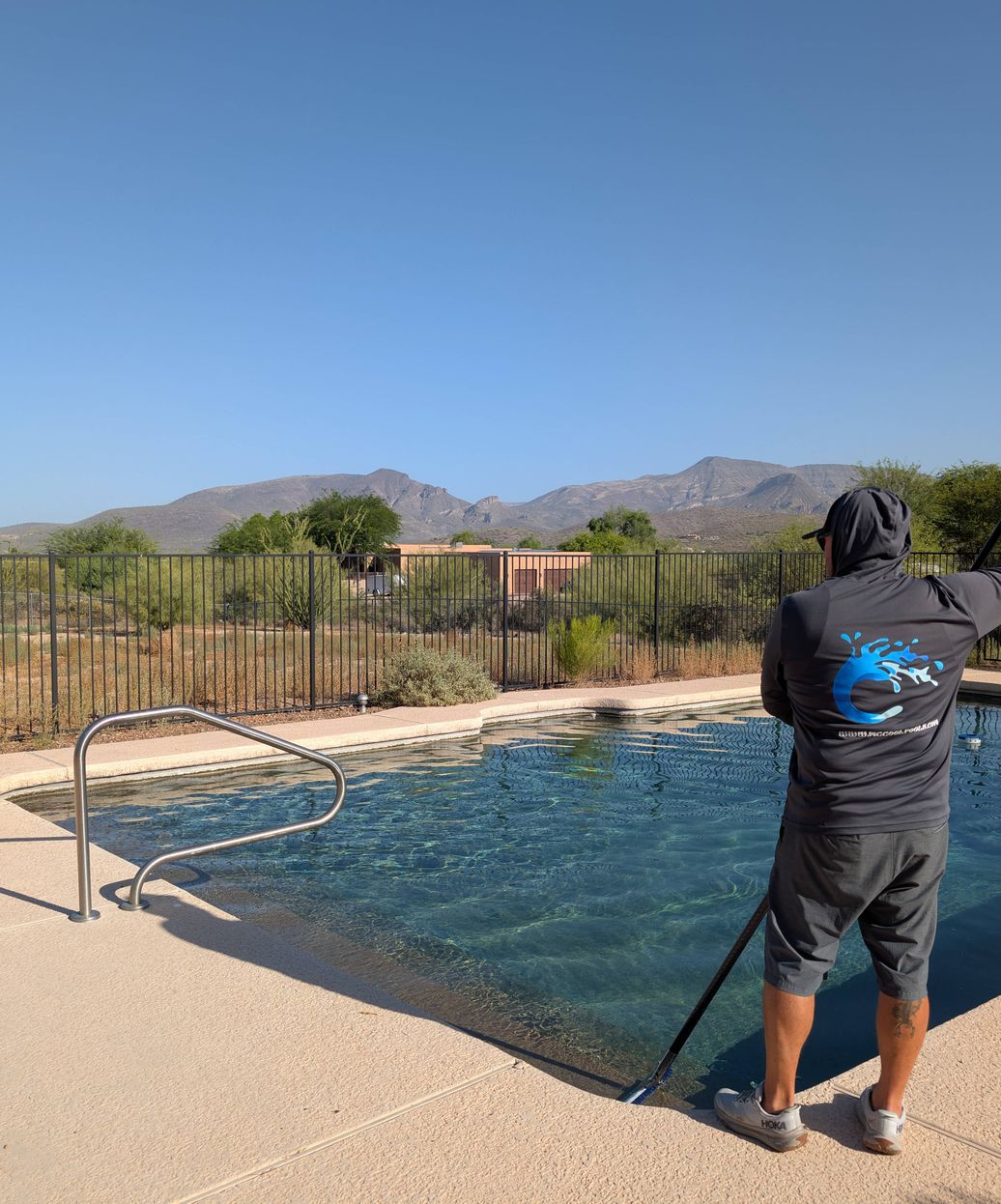 crystal clear blue pool after professional green to clear algae treatment
